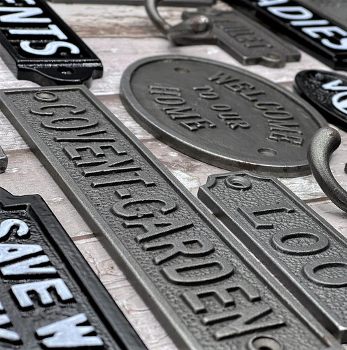 Wall plaque sign cast - wall,